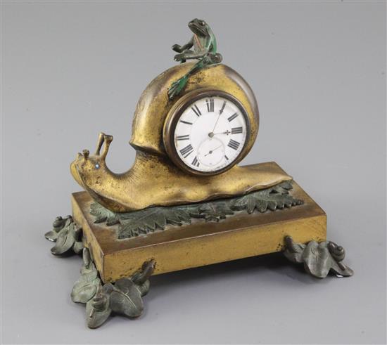 A 19th century French bronze and ormolu timepiece, height 5.5in. width 6.25in.